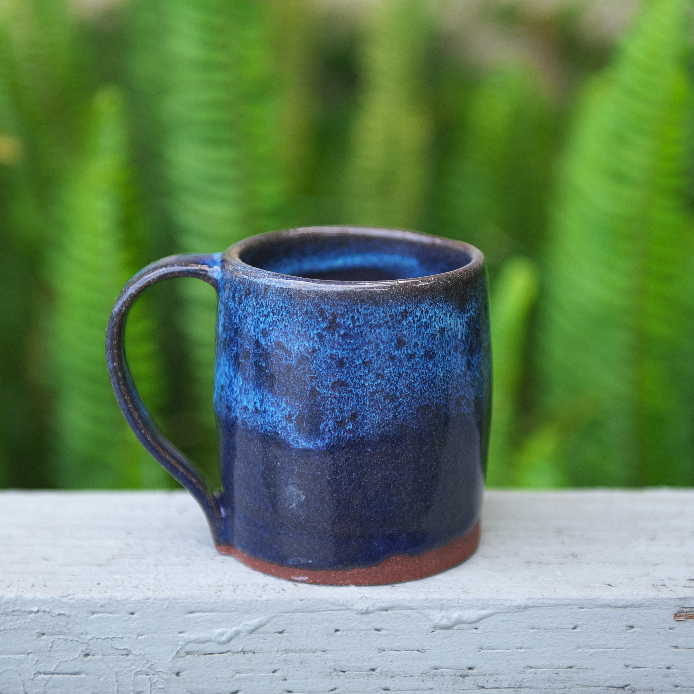 Wheel-thrown vessel with layered coastal glaze